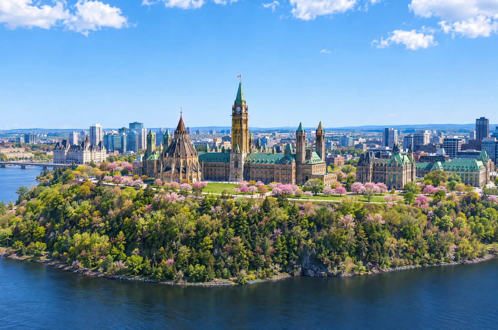 Aerial view of Parliament Hill in Ottawa above the Ottawa River in spring